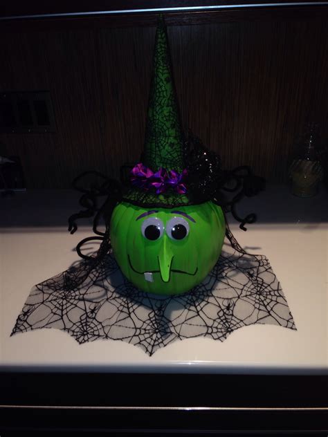Luminescent pumpkin with witch hat